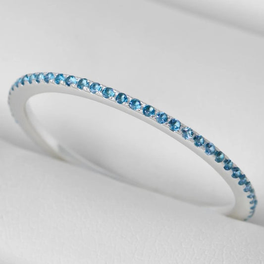 Mini Addon aus Silber, vollständig mit 0.9mm Topas Steinen besetzt – exklusiv für den Schweizer mood Ring